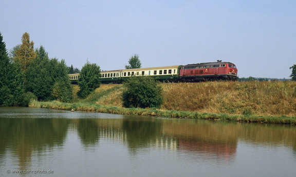 218 223